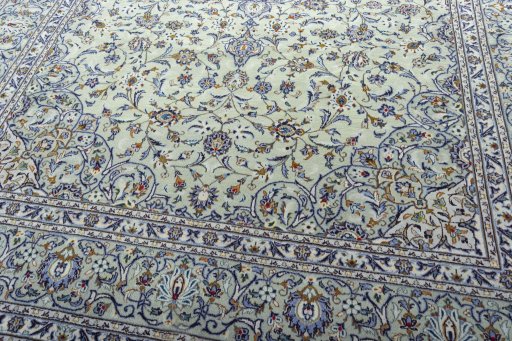 Close-up detail of 2000s Kashan rug from Iran / Persia showing Wool weave