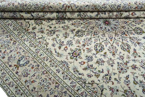 Close-up detail of 2000s Kashan rug from Iran / Persia showing Wool weave