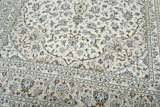Close-up detail of 2000s Kashan rug from Iran / Persia showing Wool weave