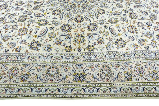 Corner detail of 1970s Kashan rug showing border pattern and Wool pile