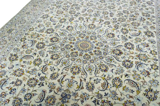 Backside of handmade 1970s Kashan rug showing knot structure and weave density