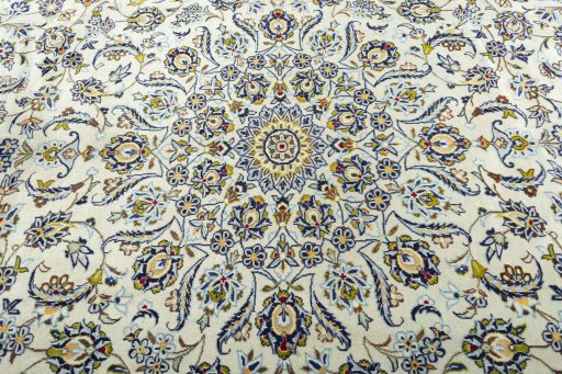 Central medallion detail of 1970s Kashan rug from Iran / Persia