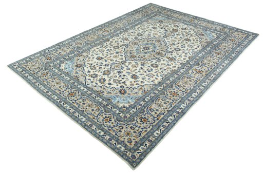 Corner detail of 2000s Kashan rug showing border pattern and Wool pile