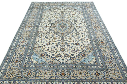 Surface texture of 2000s Kashan rug with natural Wool and intricate pattern