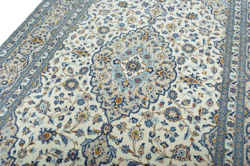 Backside of handmade 2000s Kashan rug showing knot structure and weave density