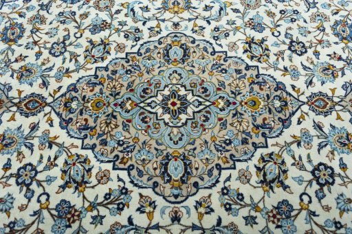 Central medallion detail of 2000s Kashan rug from Iran / Persia