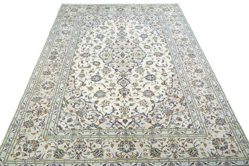 Surface texture of 2000s Kashan rug with natural Wool and intricate pattern