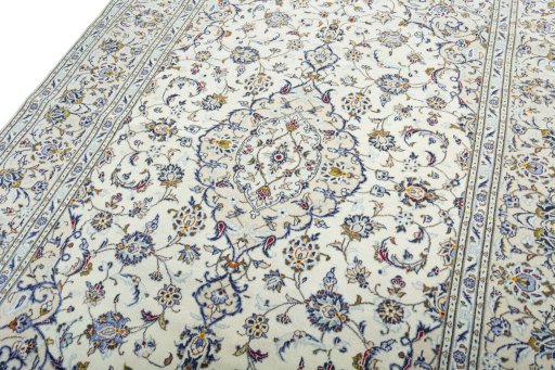 Backside of handmade 2000s Kashan rug showing knot structure and weave density