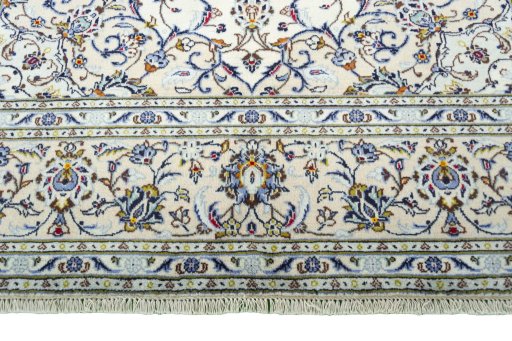 Full view of 2000s Kashan rug from Iran / Persia, 297 × 201 cm in Beige tones