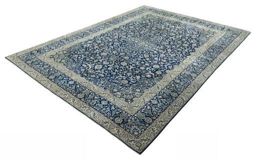 Corner detail of 2000s Kashan rug showing border pattern and Wool pile
