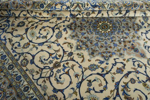 Close-up detail of 2000s Kashan rug from Iran / Persia showing Wool weave