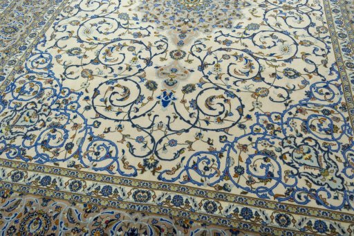 Close-up detail of 2000s Kashan rug from Iran / Persia showing Wool weave