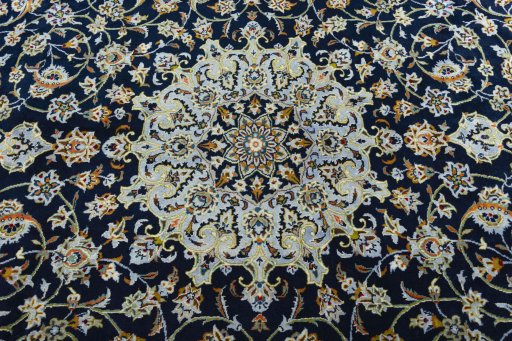 Central medallion detail of 2000s Kashan rug from Iran / Persia