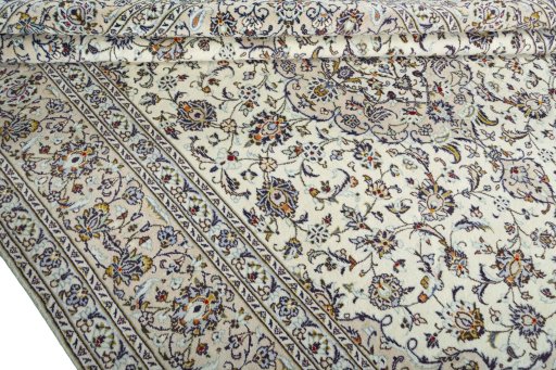 Close-up detail of 2000s Kashan rug from Iran / Persia showing Wool weave
