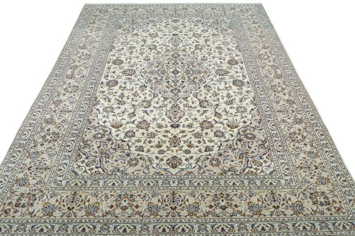 Surface texture of 2000s Kashan rug with natural Wool and intricate pattern