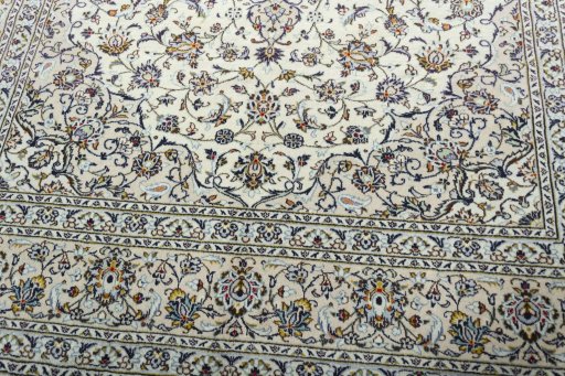 Close-up detail of 2000s Kashan rug from Iran / Persia showing Wool weave