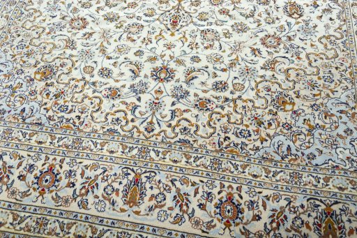 Close-up detail of 2000s Kashan rug from Iran / Persia showing Wool weave