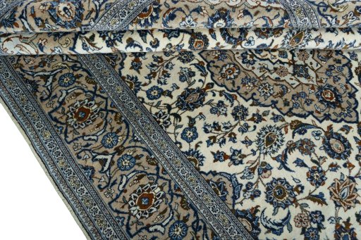 Close-up detail of 2000s Kashan rug from Iran / Persia showing Wool weave