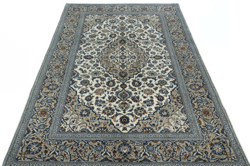 Surface texture of 2000s Kashan rug with natural Wool and intricate pattern