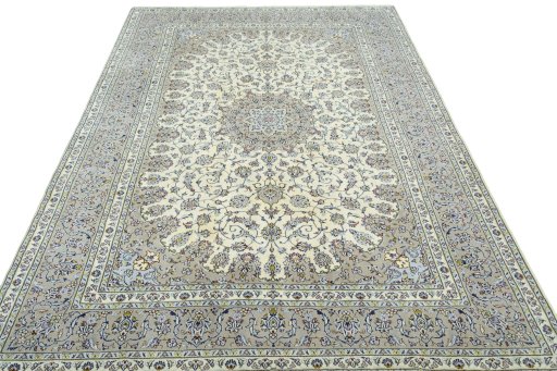 Surface texture of 2000s Kashan rug with natural Wool and intricate pattern