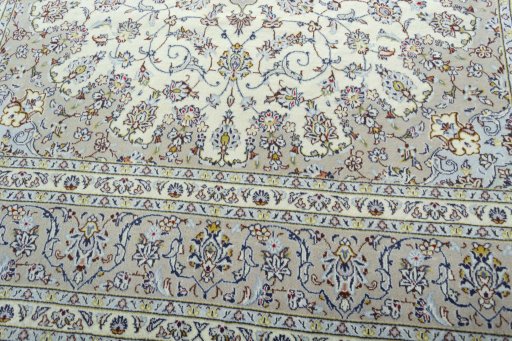 Close-up detail of 2000s Kashan rug from Iran / Persia showing Wool weave