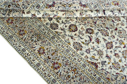 Close-up detail of 2000s Kashan rug from Iran / Persia showing Wool weave
