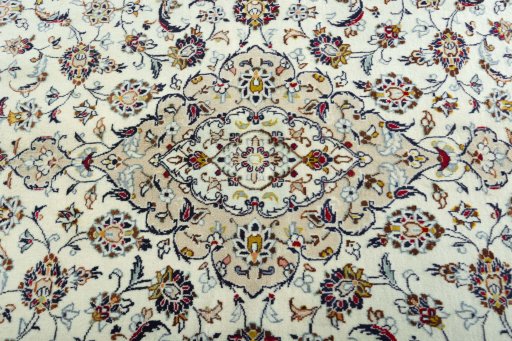 Central medallion detail of 2000s Kashan rug from Iran / Persia