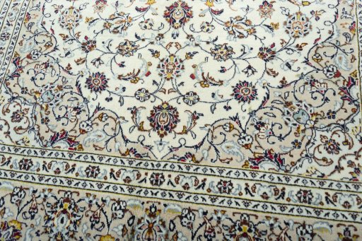Close-up detail of 2000s Kashan rug from Iran / Persia showing Wool weave