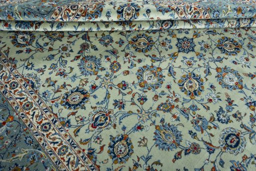 Close-up detail of 2000s Kashan rug from Iran / Persia showing Wool weave
