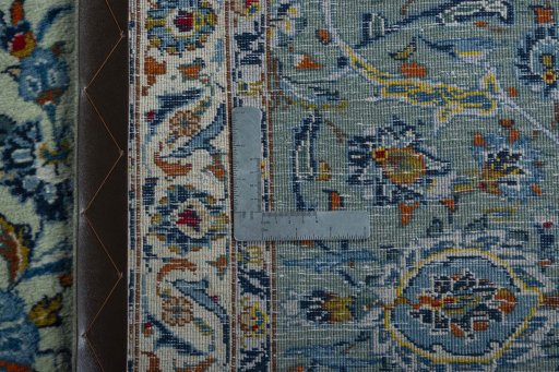 Backside of handmade 2000s Kashan rug showing knot structure and weave density