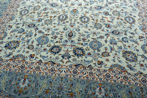 Close-up detail of 2000s Kashan rug from Iran / Persia showing Wool weave