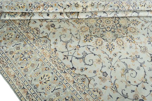 Close-up detail of 2000s Kashan rug from Iran / Persia showing Wool weave