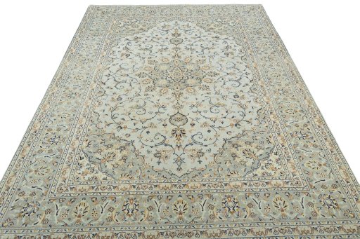 Surface texture of 2000s Kashan rug with natural Wool and intricate pattern