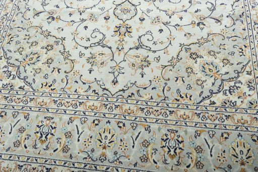 Close-up detail of 2000s Kashan rug from Iran / Persia showing Wool weave