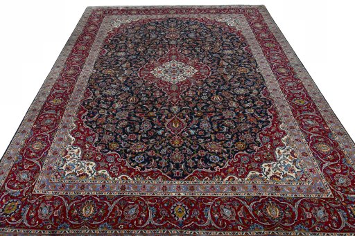 Surface texture of 2000s Kashan rug with natural Wool and intricate pattern
