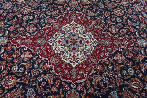 Central medallion detail of 2000s Kashan rug from Iran / Persia
