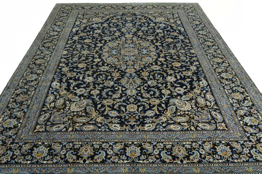 Surface texture of 2000s Kashan rug with natural Wool and intricate pattern