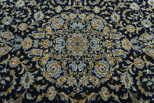 Central medallion detail of 2000s Kashan rug from Iran / Persia