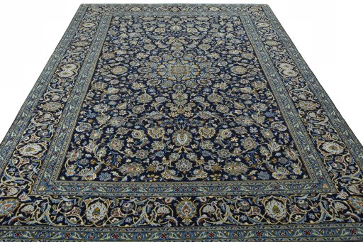 Surface texture of 2000s Kashan rug with natural Wool and intricate pattern