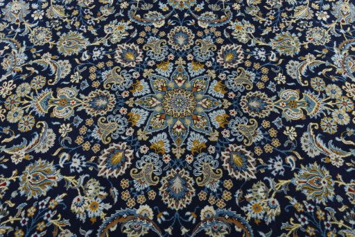 Central medallion detail of 2000s Kashan rug from Iran / Persia