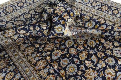 Surface texture of 1970s Kashan rug with natural Wool and intricate pattern