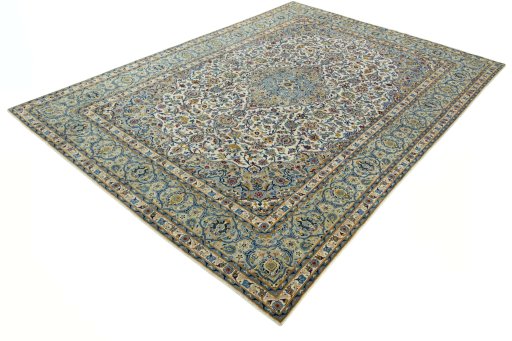 Corner detail of 2000s Kashan rug showing border pattern and Wool pile