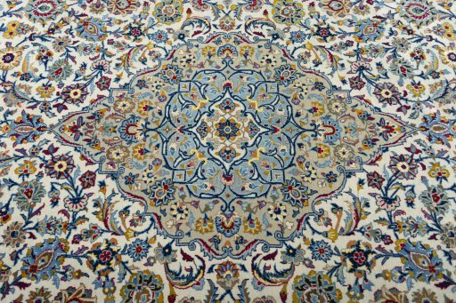 Central medallion detail of 2000s Kashan rug from Iran / Persia