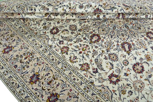 Close-up detail of 2000s Kashan rug from Iran / Persia showing Wool weave