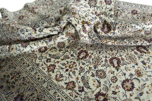 Surface texture of 2000s Kashan rug with natural Wool and intricate pattern