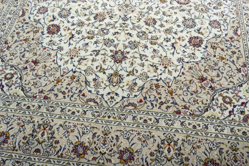 Close-up detail of 2000s Kashan rug from Iran / Persia showing Wool weave