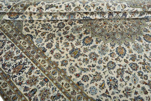Close-up detail of 2000s Kashan rug from Iran / Persia showing Wool weave
