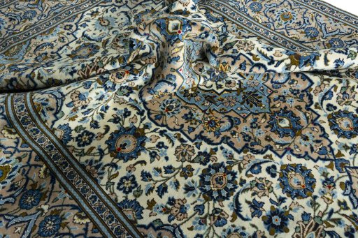 Surface texture of 2000s Kashan rug with natural Wool and intricate pattern