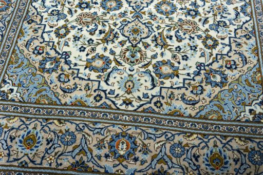 Close-up detail of 2000s Kashan rug from Iran / Persia showing Wool weave