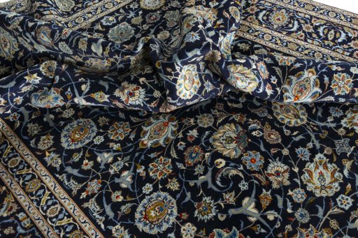 Surface texture of 2000s Kashan rug with natural Wool and intricate pattern